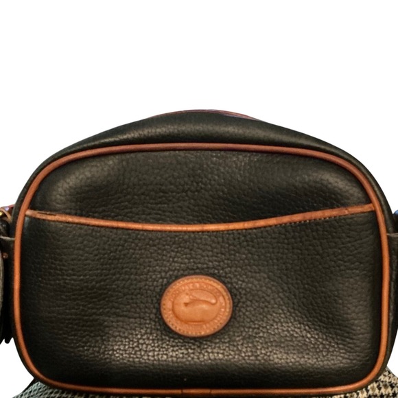 Dooney & Bourke Handbags - Vintage Dooney & Bourke Black Leather Saddle Bag Brown Trim Flap Closure